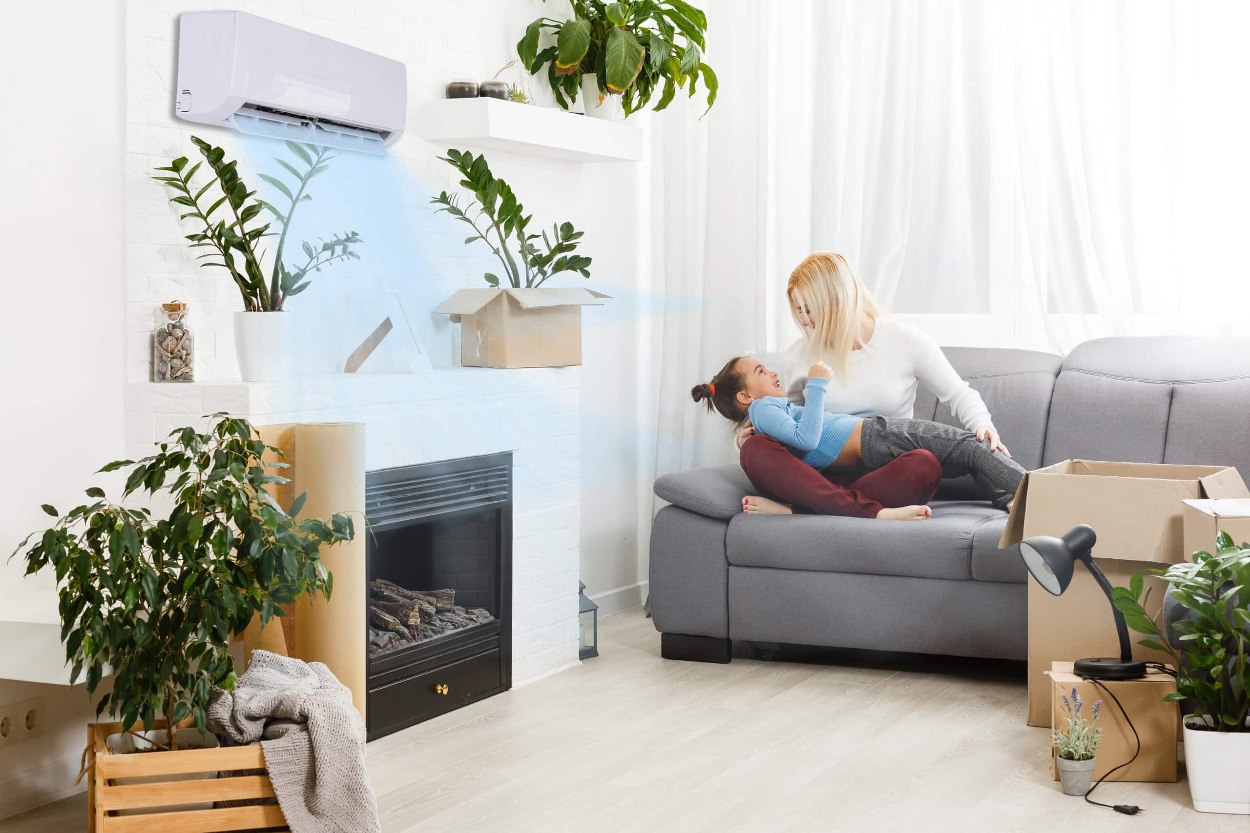 Parent and child in living room with good air quality