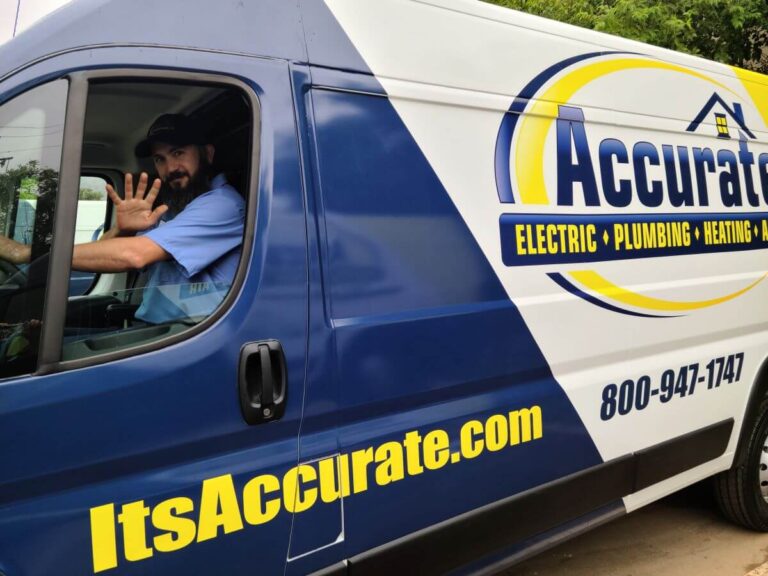 Air conditioning repair van driving with technician waiving