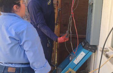 Electrician installing a panel in Rancho Cucamonga CA